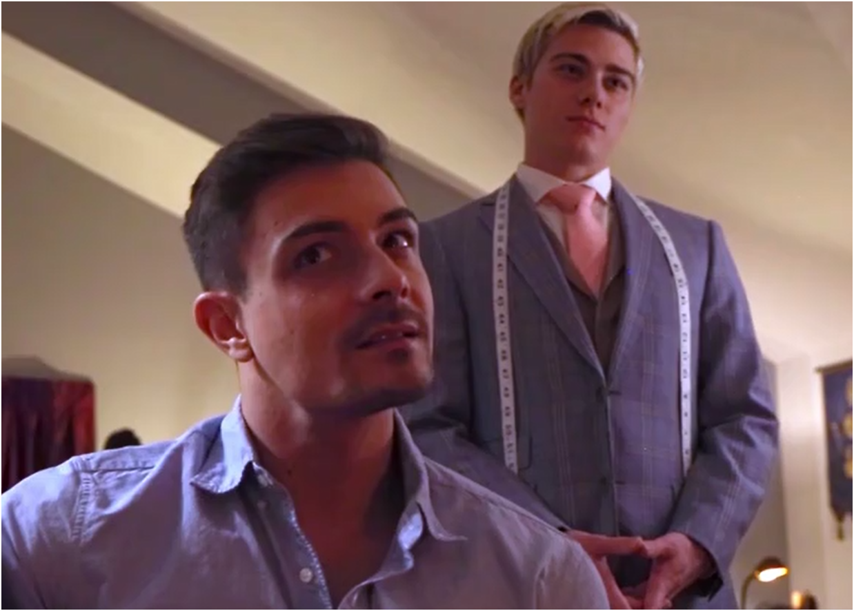 He, bewildered, feels subjugated by the charm and imperious manner of the young tailor